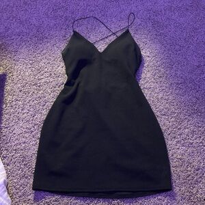black mini dress, open back
